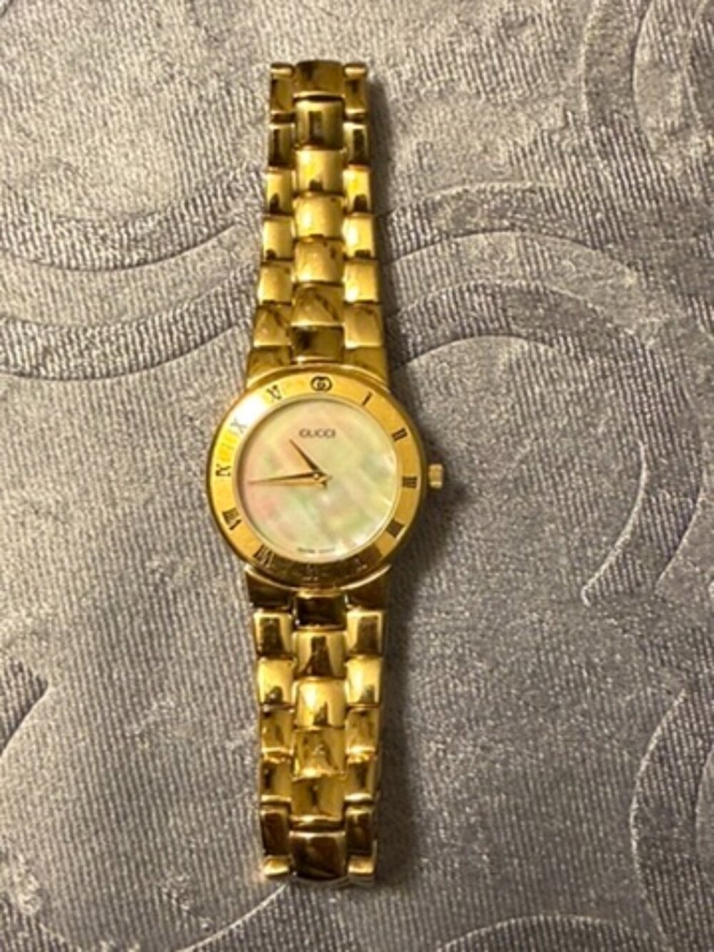 Gucci 3300.2.M watch with Mother of Pearl face.
